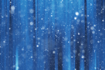 Obraz na płótnie Canvas blue snow lines background / abstract background christmas blue snowflakes blurred background, snow flakes