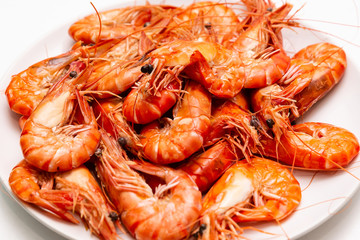 A plate of boiled king prawns close-up