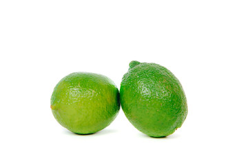 Green lime isolated. Resistance and health. Concept of eating, using fruits for dishes. Dish for a vegetarian. Healthy nutrition, eating vitamins. Citrus food, exotic fruits.