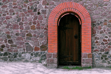 Fototapeta na wymiar Antique cinnamon wooden door