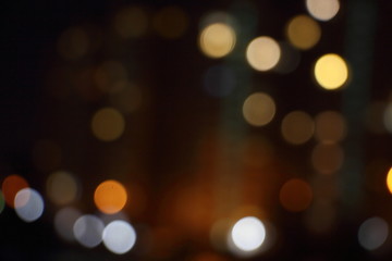 Fototapeta premium Abstract blurred lights in dark - texture for backdrop