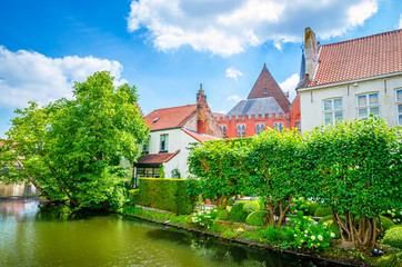 Beautiful canal and traditional houses in the old town of Bruges (Brugge), Belgium