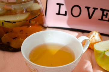 fruit tea in a glass teapot