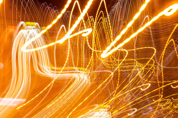 creative photography with unusual pattern of dancing light or neon in chaotic multi colored lines on abstract background. concept of unique desktop wallpaper or screensaver. copy space, texture, blur