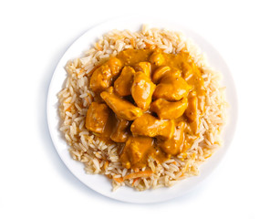 Rice with chicken curry sauce with cashew isolated on white background.