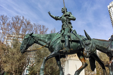 Fototapeta premium Monument to Cervantes and Don Quixote and Sancho Panza at Spain Square in City of Madrid, Spain