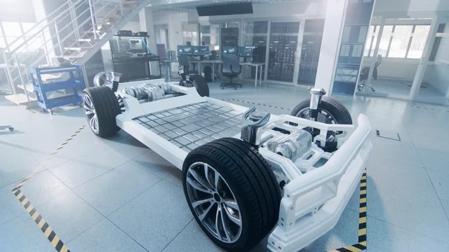 Concept of Authentic Electric Car Platform Chassis Prototype Standing in High Tech Industrial Machinery Design Laboratory. Hybrid Frame include Tires, Suspension, Engine and Battery. 