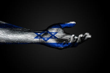 Outstretched hand with a drawn Israel flag, a sign of help or a request, on a dark background.