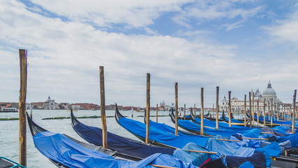 Gondolas by Grand Canal near San Marco square in Venice, Italy