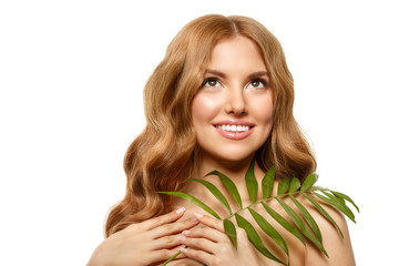 Naklejka premium Spa girl. beauty Young Woman with Clean Fresh Skin with tropical leaves. Facial treatment. Model with Expressive facial expressions. Cosmetology.
