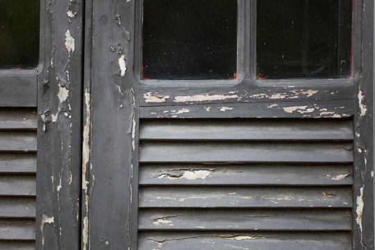 Old peeled gray window