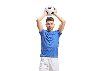 Football player taking a throw-in