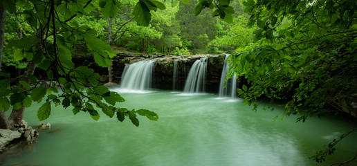 Falling water falls an Arkansas Ozark Mountain waterfall deep in the Arkansas forest.