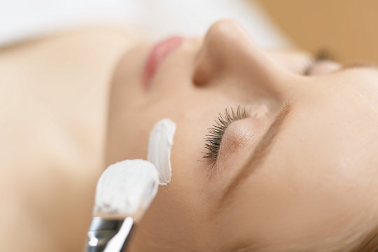 Spa facial mask application. Spa beauty organic facial mask application at day spa salon