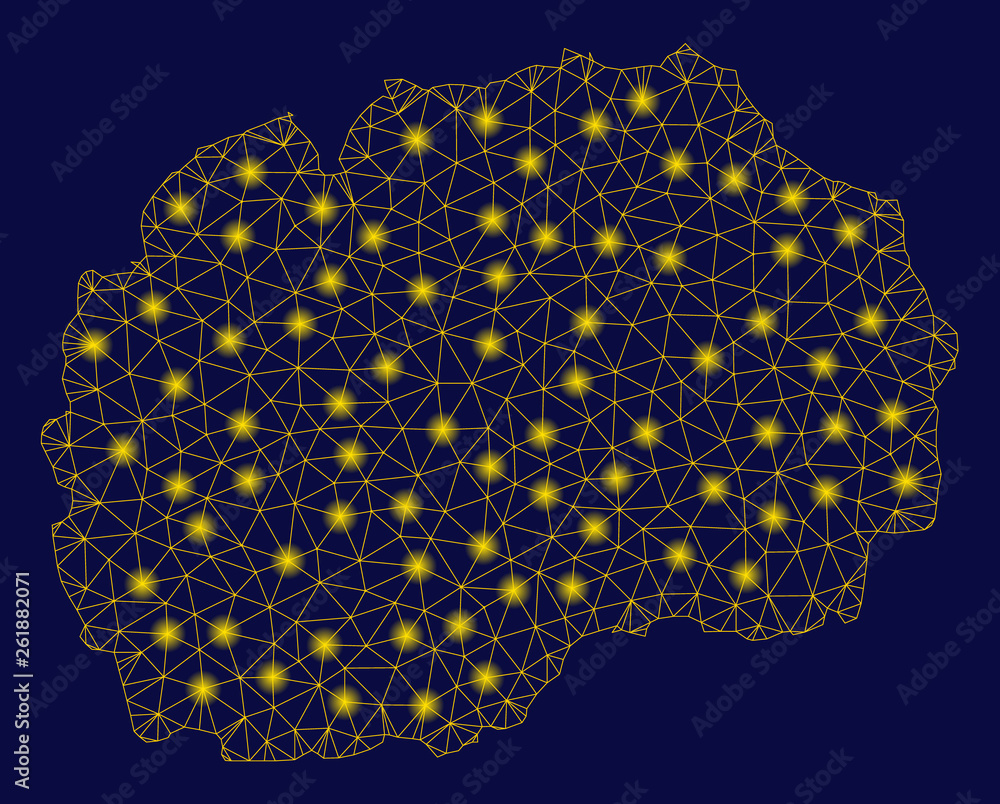Poster bright yellow mesh macedonia map with lightspot effect. wire carcass polygonal mesh in vector eps10 