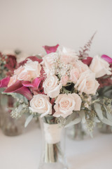 Pink roses and Calla Lily bridal bouquets on white background