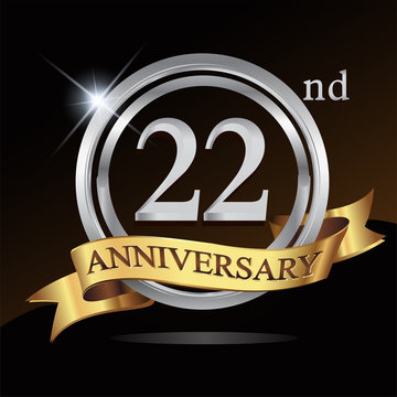 22nd anniversary logo, with shiny silver ring and gold ribbon isolated on black background. vector design for birthday celebration.