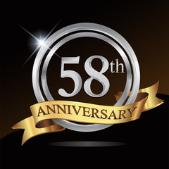 58th anniversary logo, with shiny silver ring and gold ribbon isolated on black background. vector design for birthday celebration.
