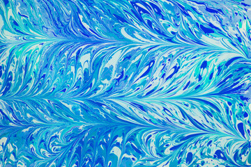 Beautiful abstract painting is a painting technique Ebru .Turkish Ebru style on the water with acrylic paints wring wave.Stylish combination of luxury.Contemporary art marble liquid texture 