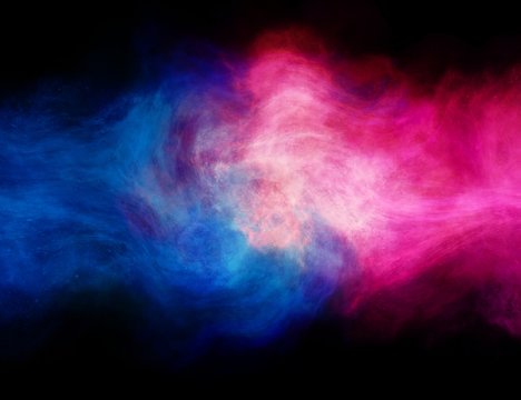 Abstract nebula smoke fire in red and blue light isolated on black background in concept of versus, competition, fight