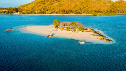 Crowded tourists visiting Gili Kedis island