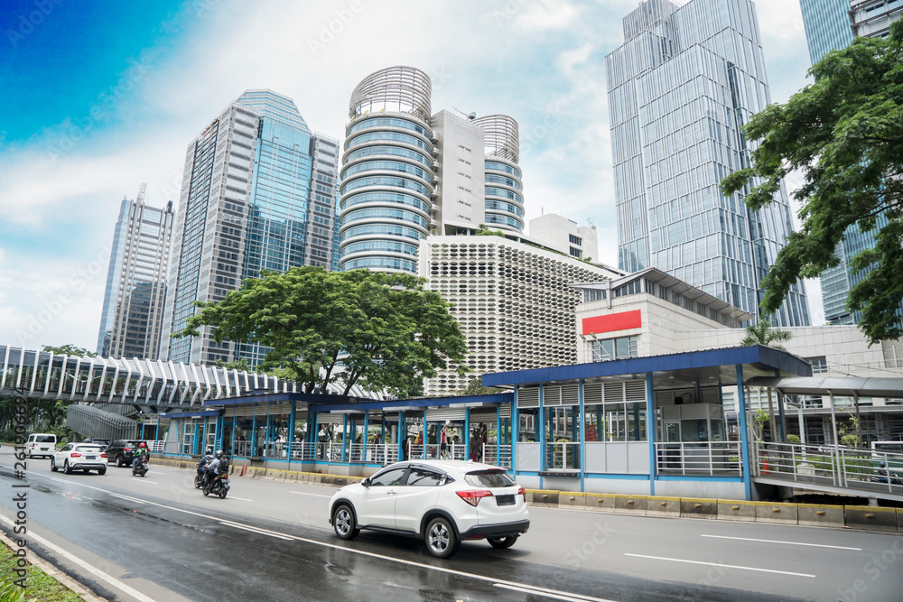 Wall mural vehicles with bus shelter and pedestrian bridge