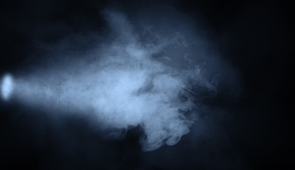 Fototapeta na wymiar Blue studio spotlight . Stage with smoke on isolated background. Design element.