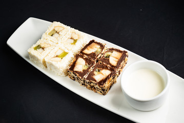 sweet sushi with fruits and chocolate
