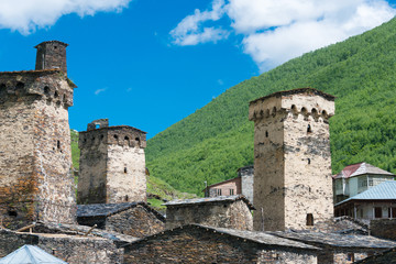 Fototapeta na wymiar Ushguli, Georgia - Jun 21 2018: Svan Towers at Ushguli village in Samegrelo-Zemo Svaneti, Georgia. It is part of the UNESCO World Heritage Site - Upper Svaneti.
