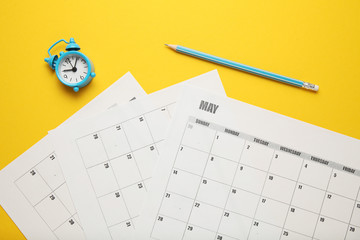 Business calendar, pencil and clock. Date reminder, office schedule.