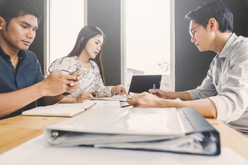 Business meeting concept; Business people and staff meeting in office to briefing strategy information of corporate; Strategy Department in corporate brainstorming at meeting room