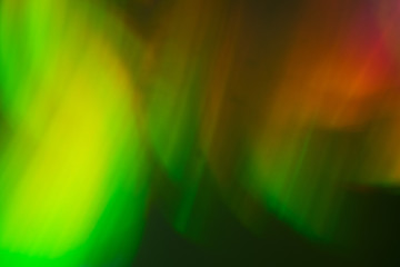 North blurry light. Night faded sky. Bokeh color background. Lens flare backdrop.