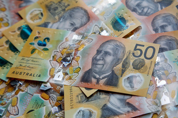 Australian fifty dollar banknotes. The new 2019 issue bill is designed to deter counterfeiting, the...