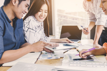 Obraz premium Business meeting concept; Business people and staff meeting in office to briefing strategy information of corporate; Strategy Department in corporate brainstorming at meeting room