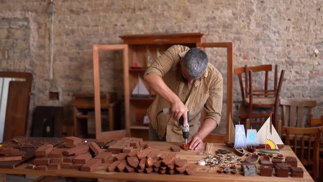 Carpenter working in workshop