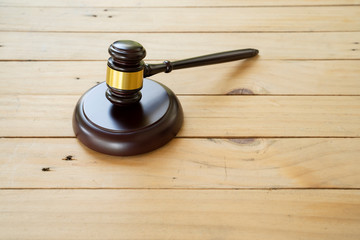 Hammer on the wooden table - picture