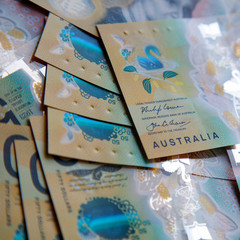 Australian fifty dollar banknotes. The new 2019 issue bill is designed to deter counterfeiting, the...