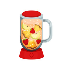 Cocktail with apple, pineapple, strawberry in red blender.