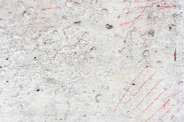 Wall fragment with scratches and cracks