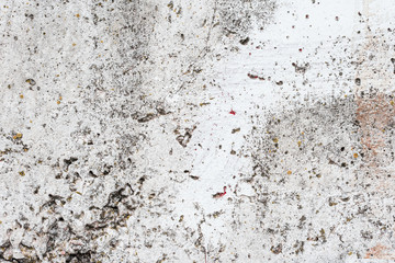 Wall fragment with scratches and cracks