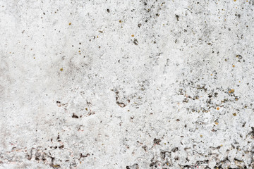 Wall fragment with scratches and cracks