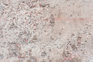 Wall fragment with scratches and cracks