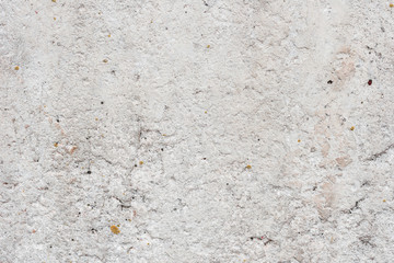 Wall fragment with scratches and cracks