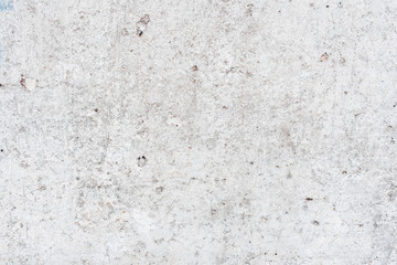 Wall fragment with scratches and cracks