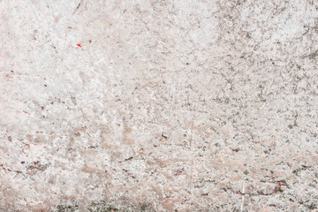 Wall fragment with scratches and cracks