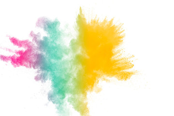 Fototapeta na wymiar Colorful powder explosion on white background.Pastel color dust particle splashing.