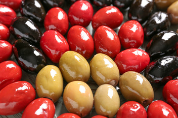 Assortment of tasty olives, closeup