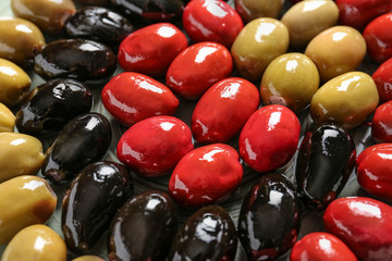 Assortment of tasty olives, closeup