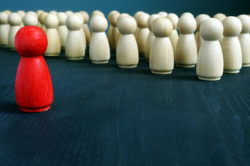 Management and leadership concept. Leader in front of crowd.