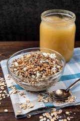 Oatmeal with cottage cheese, honey, peanut and sunflower seeds.